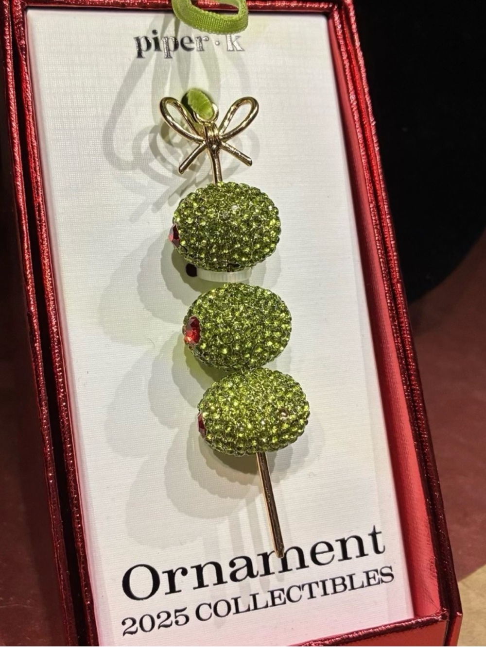 PIPER K RHINESTONE MARTINI
OLIVES CHRISTMAS ORNAMENT
2025 COLLECTIBLE New in Box
